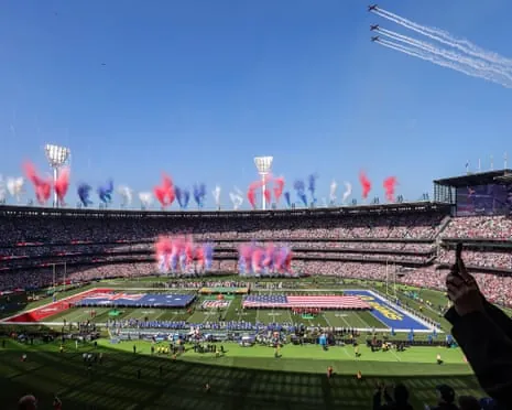 The Royal Australian Air Force Roulettes perform a flyover at the NFL match between Los Angeles Rams and San Francisco 49ers at the MCG.